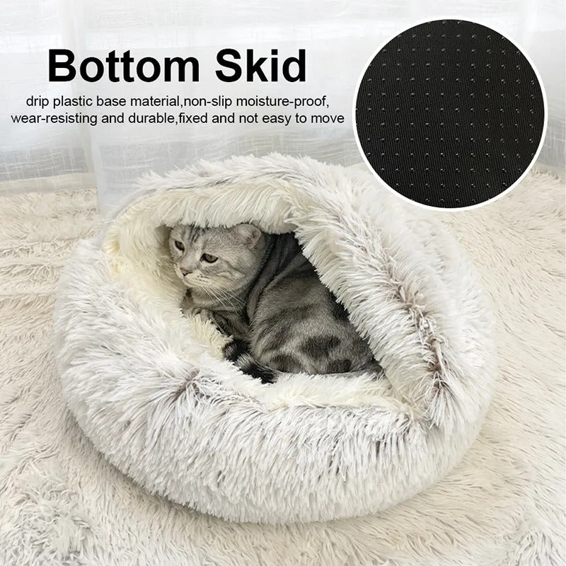 grey cat bed with fluffy white material inside and a cat